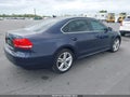 2014 Volkswagen Passat — photo 4 of 11 | VIN 1VWBN7A33EC105565