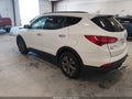 2016 Hyundai Santa Fe — photo 3 of 16 | VIN 5XYZU3LB6GG347511