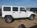 2015 Jeep Wrangler Unlimited — photo 13 of 16 | VIN 1C4HJWEG6FL610937