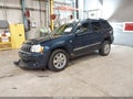 2009 Jeep Grand Cherokee — photo 2 of 16 | VIN 1J8HR58T99C516124
