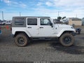 2011 Jeep Wrangler Unlimited — photo 14 of 17 | VIN 1J4BA5H16BL618693