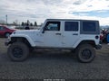 2011 Jeep Wrangler Unlimited — photo 15 of 17 | VIN 1J4BA5H16BL618693