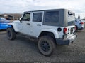 2011 Jeep Wrangler Unlimited — photo 3 of 17 | VIN 1J4BA5H16BL618693