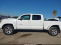 2013 Toyota Tacoma — photo 14 of 16 | VIN 3TMKU4HN1DM037341