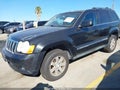 2009 Jeep Grand Cherokee — photo 2 of 11 | VIN 1J8GS58K09C548306