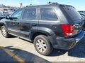 2009 Jeep Grand Cherokee — photo 3 of 11 | VIN 1J8GS58K09C548306