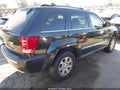 2009 Jeep Grand Cherokee — photo 4 of 11 | VIN 1J8GS58K09C548306