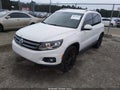 2012 Volkswagen Tiguan — photo 2 of 12 | VIN WVGAV7AX7CW580015
