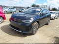 2023 Volkswagen ID.4 — photo 2 of 18 | VIN 1V2JNPE89PC043899