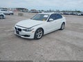 2014 BMW 3 Series — photo 2 of 11 | VIN WBA3C1C52EK105777