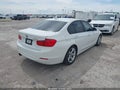 2014 BMW 3 Series — photo 4 of 11 | VIN WBA3C1C52EK105777