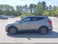 2013 Hyundai Santa Fe — photo 14 of 16 | VIN 5XYZU3LB7DG021891