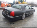 2004 Lincoln Town Car — photo 4 of 12 | VIN 1LNHM83W64Y657300