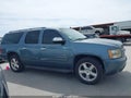 2010 Chevrolet Suburban 1500 — photo 13 of 16 | VIN 1GNUCHE04AR156210