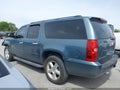 2010 Chevrolet Suburban 1500 — photo 14 of 16 | VIN 1GNUCHE04AR156210