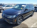 2018 Volkswagen Tiguan — photo 2 of 16 | VIN 3VV3B7AX1JM161954