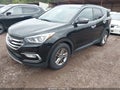 2017 Hyundai Santa Fe — photo 2 of 16 | VIN 5NMZU3LB7HH024303