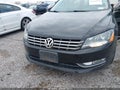 2014 Volkswagen Passat — photo 6 of 11 | VIN 1VWCN7A31EC057603