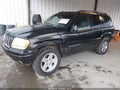 2002 Jeep Grand Cherokee — photo 2 of 11 | VIN 1J4GX58N92C311011