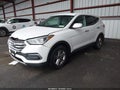 2018 Hyundai Santa Fe — photo 2 of 16 | VIN 5NMZTDLB7JH088582