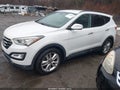 2014 Hyundai Santa Fe — photo 2 of 16 | VIN 5XYZU3LA0EG165971