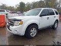 2009 Ford Escape — photo 2 of 18 | VIN 1FMCU03779KB02760
