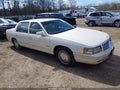 1999 Cadillac Deville — photo 1 of 11 | VIN 1G6KD54Y2XU717631