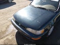 1997 Toyota Corolla — photo 12 of 15 | VIN 1NXBB02E0VZ554954