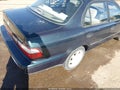 1997 Toyota Corolla — photo 15 of 15 | VIN 1NXBB02E0VZ554954