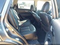 2016 Nissan Rogue — photo 8 of 11 | VIN 5N1AT2MT1GC815565