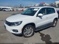 2014 Volkswagen Tiguan — photo 2 of 11 | VIN WVGAV3AX5EW510993