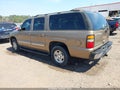 2004 Chevrolet Suburban 1500 — photo 3 of 11 | VIN 1GNEC16Z74J125092