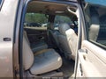 2004 Chevrolet Suburban 1500 — photo 8 of 11 | VIN 1GNEC16Z74J125092