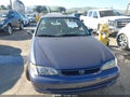 2000 Toyota Corolla — photo 6 of 11 | VIN 1NXBR12E7YZ335057