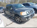 2012 Nissan Titan — photo 1 of 11 | VIN 1N6BA0ED9CN311495