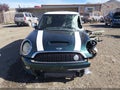 2009 Mini Cooper — photo 13 of 17 | VIN WMWMF73599TT99161