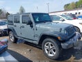 2015 Jeep Wrangler Unlimited — photo 12 of 15 | VIN 1C4BJWDG2FL588247
