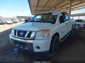 2013 Nissan Titan — photo 2 of 18 | VIN 1N6AA0EJ9DN302900