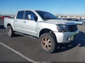 2004 Nissan Titan — photo 1 of 16 | VIN 1N6AA07A34N559287