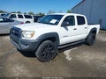 2015 Toyota Tacoma — photo 2 of 17 | VIN 5TFJU4GNXFX066668