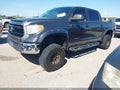 2015 Toyota Tundra — photo 2 of 16 | VIN 5TFEM5F13FX087206