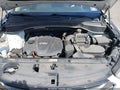 2013 Hyundai Santa Fe — photo 10 of 11 | VIN 5XYZU3LB0DG108404