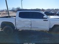 2019 Toyota Tacoma — photo 13 of 16 | VIN 5TFCZ5AN5KX205981
