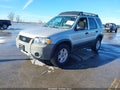 2005 Ford Escape — photo 2 of 11 | VIN 1FMYU03135KA28846