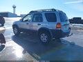 2005 Ford Escape — photo 3 of 11 | VIN 1FMYU03135KA28846