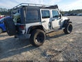 2012 Jeep Wrangler Unlimited — photo 4 of 16 | VIN 1C4BJWDG1CL198395