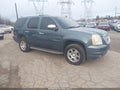 2007 GMC Yukon — photo 1 of 12 | VIN 1GKFK638X7J284349