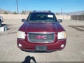 2003 GMC Envoy — photo 13 of 17 | VIN 1GKET16S436150291