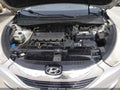 2012 Hyundai Tucson — photo 10 of 11 | VIN KM8JUCAC0CU372353