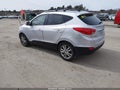 2012 Hyundai Tucson — photo 3 of 11 | VIN KM8JUCAC0CU372353